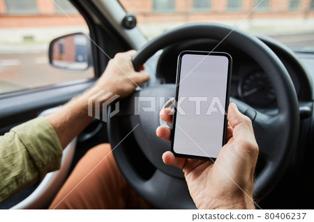 Driver using Smartphone in Car Driver using Smartphone in Car 80406237