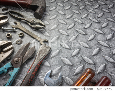 tools  on Checker plate  for safety  or engineer concept. 80407669