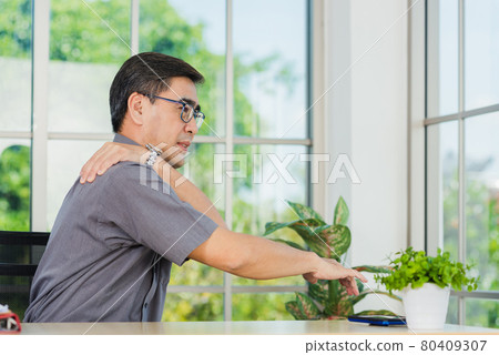 businessman working with laptop computer has a problem with shoulder pain businessman working with laptop computer has a problem with shoulder pain 80409307