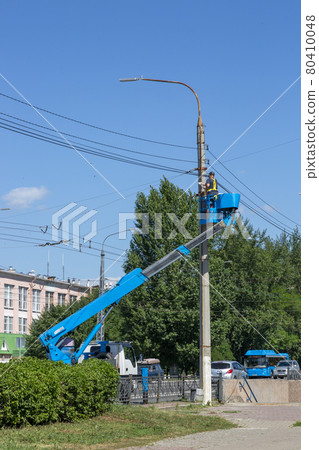 Belgorod, Russia - July 08, 2021: Repair work on the power line in Belgorod Belgorod, Russia - July 08, 2021: Repair work on the power line in Belgorod 80410048