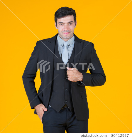 Caucasian businessman in gray shirt and black suit, Put his hand in the pocket pant and smiling humble. The concept of investment. 80412927