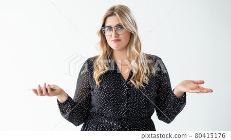 confused woman portrait clueless shrug obese model confused woman portrait clueless shrug obese model 80415176