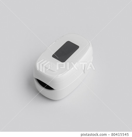 Pulse oximeter or blood oxygen level measure monitor device isolated on white background. Diagnosis self check up. Medical and healthcare equipment. Coronavirus covid-19 outbreak. Pulse oximeter or blood oxygen level measure monitor device isolated on white background. Diagnosis self check up. Medical and healthcare equipment. Coronavirus covid-19 outbreak. 80415545