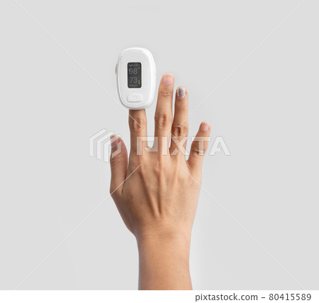 Hand with pulse oximeter or blood oxygen level measure monitor device with display isolated on white background. Diagnosis self check up. Medical and healthcare equipment.Coronavirus covid-19 outbreak Hand with pulse oximeter or blood oxygen level measure monitor device with display isolated on white background. Diagnosis self check up. Medical and healthcare equipment.Coronavirus covid-19 outbreak 80415589