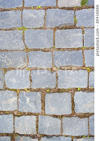 Old aged granite paving stones 80416666