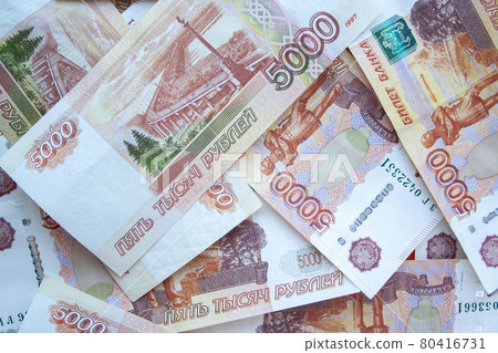 Rouble 5000 banknotes background top view. Rouble 5000 banknotes background top view. 80416731