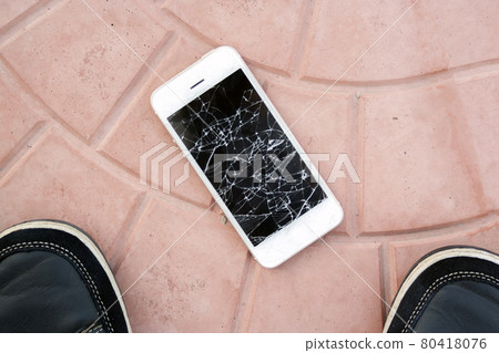 Top view broken phone 80418076