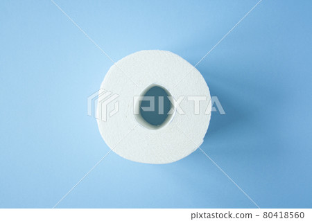 Toilet paper roll on a blue background top view. 80418560
