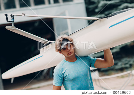 Sportsman single scull man rower prepare to competition boat regatta. Olympic games sport. 80419603