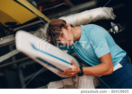 Sportsman single scull man rower prepare to competition boat regatta. Olympic games sport. 80419605