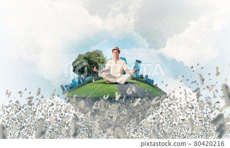 Young man keeping mind conscious. Young man keeping mind conscious. 80420216