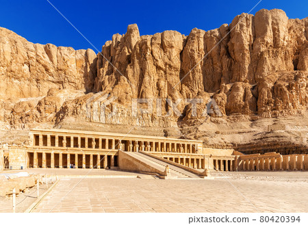 Mortuary Temple of Hatshepsut in the rocks, Nubian Desert, Luxor, Egypt 80420394
