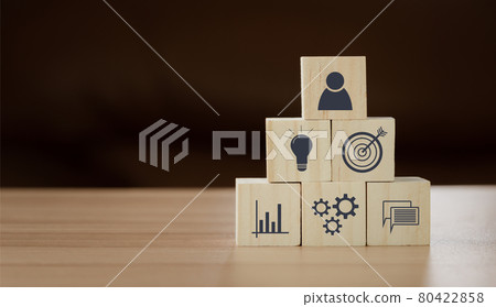 Close up of wood block with business and finance icon background concept. Human resource management, Strategy target planning , Success and synergy plan, Innovation creative new idea financial. 80422858