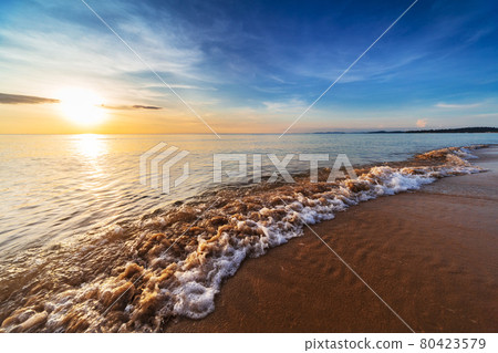 beautiful sunset over tranquil ocean beautiful sunset over tranquil ocean 80423579