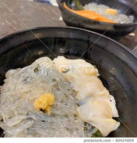 Seafood bowl with mashed shellfish and raw shirasu Seafood bowl with mashed shellfish and raw shirasu 80424809