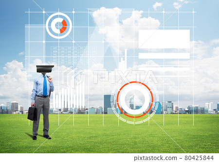 Camera headed man standing on green grass against modern cityscape Camera headed man standing on green grass against modern cityscape 80425844
