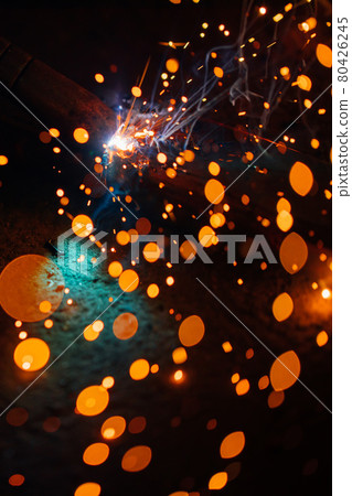 artistic welding sparks light, industrial background artistic welding sparks light, industrial background 80426245