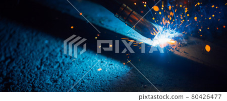 artistic welding sparks light, industrial background 80426477