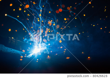 artistic welding sparks light, industrial background 80426628
