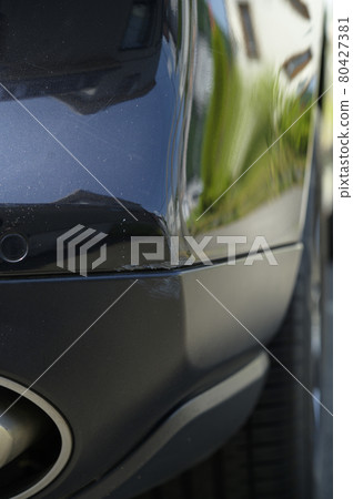 Scratches on the bumper of a car 80427381