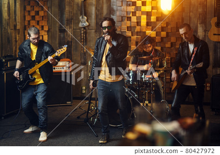 Brutal artists, music performing on stage Brutal artists, music performing on stage 80427972