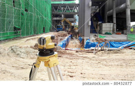JOHOR, MALAYSIA -JULY 21, 2016: A survey equipment used by land surveyor at construction site to determine and levels and positions. JOHOR, MALAYSIA -JULY 21, 2016: A survey equipment used by land surveyor at construction site to determine and levels and positions. 80432877