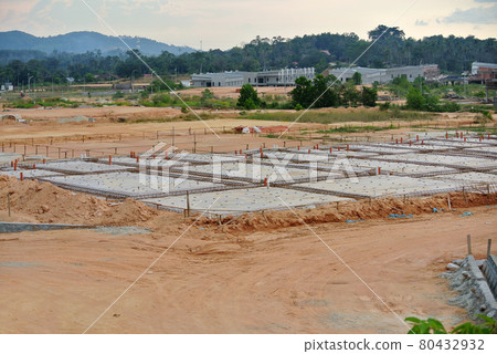 CYBERJAYA, MALAYSIA -SEPTEMBER 10, 2013: Construction site at early stage during daytime. Some area earthwork still ongoing.  80432932