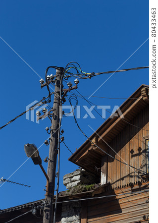 old wires on electric pole 80433463