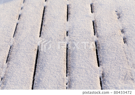 Snow covered wood terrace Snow covered wood terrace 80433472