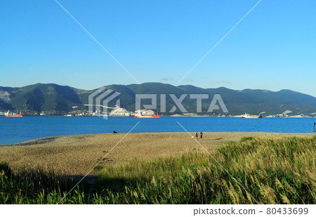 Magnificent blue sea and mountains background Magnificent blue sea and mountains background 80433699