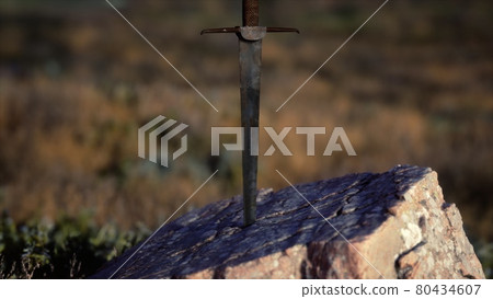 famous sword excalibur of King Arthur in the rock 80434607