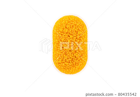 Plastic box with yellow round beads isolated on white background. Plastic box with yellow round beads isolated on white background. 80435542