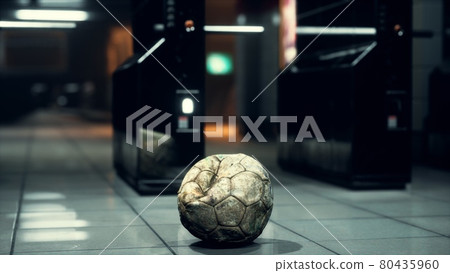 old soccer ball in empty subway old soccer ball in empty subway 80435960