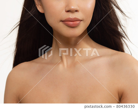 Sexual full lips. Natural gloss of lips and woman's skin. The mouth is closed. Increase in lips, cosmetology. Natural lips. Great summer mood with open eyes. fashion jewelry. Pink lip gloss 80436330