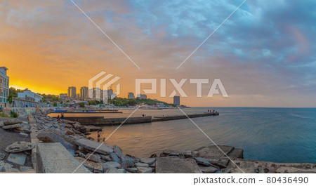 panoramic view of the black sea, beaches and buildings in the Arcadia quarter in Odessa at sunset 80436490