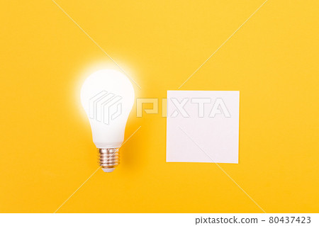 A Power Saving Lamp with White Note Paper A Power Saving Lamp with White Note Paper 80437423