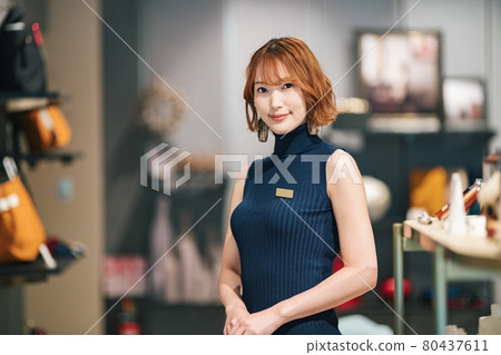 Portrait of a female shop clerk at a general store Portrait of a female shop clerk at a general store 80437611