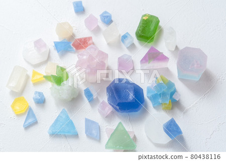 Colorful amber sugar that allows light to pass through and is transparent, colorful gems, glitter 80438116