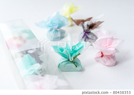 Rakugan, a cute Japanese sweet wrapped in colorful Japanese paper Rakugan, a cute Japanese sweet wrapped in colorful Japanese paper 80438353