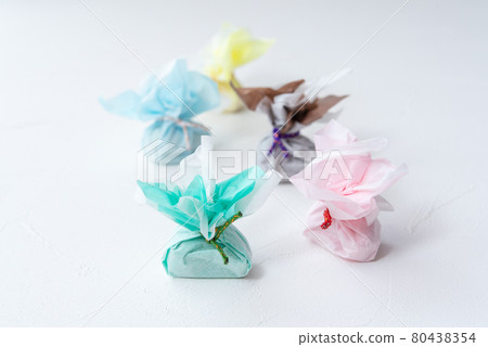 Rakugan, a cute Japanese sweet wrapped in colorful Japanese paper Rakugan, a cute Japanese sweet wrapped in colorful Japanese paper 80438354