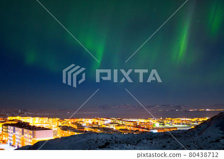 Majestic arctic landscape with aurora borealis over the northern city of Anadyr Majestic arctic landscape with aurora borealis over the northern city of Anadyr 80438712