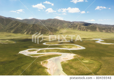 Winding rivers and meadows. Photo in Bayinbuluke Grassland in Xinjiang, China. Winding rivers and meadows. Photo in Bayinbuluke Grassland in Xinjiang, China. 80439348