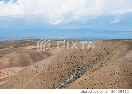 The desert and the mountains in a cloudless day. The desert and the mountains in a cloudless day. 80439413