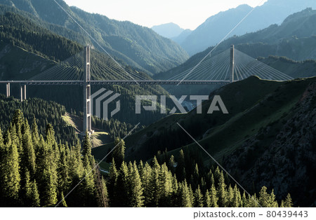 The bridge between the mountains. Guozigou Bridge in Xinjiang, China. The bridge between the mountains. Guozigou Bridge in Xinjiang, China. 80439443