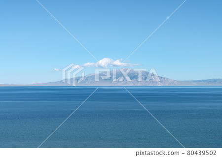 Lake and mountains in a sunny day. Shot in Sayram Lake in Xinjiang, China. 80439502