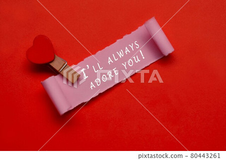 I will always adore you label on torn paper with red paper background I will always adore you label on torn paper with red paper background 80443261