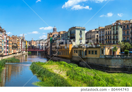 Colorful houses and Eiffel bridge in Girona Colorful houses and Eiffel bridge in Girona 80444743