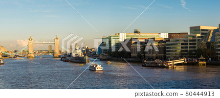 Tower Bridge and HMS Belfast warship in London 80444913