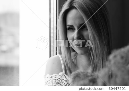 portrait of a woman in profile. The face is covered with hair. The concept of skin care, natural cosmetics, Brazilian blowout, chemistry, painting with henna 80447201