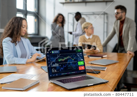 Laptop display with financial graph and other data Laptop display with financial graph and other data 80447711